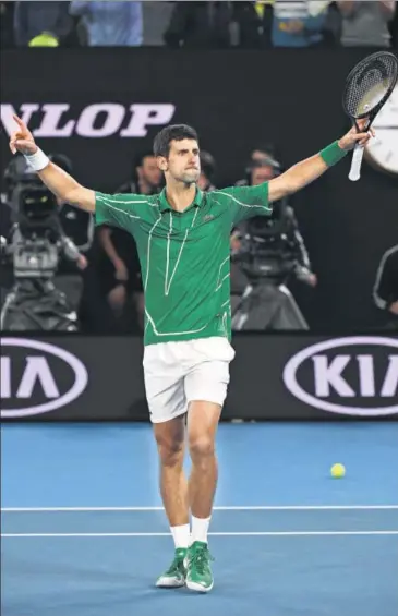  ??  ?? Novak Djokovic celebrates after beating Dominic Thiem in the men's final of the Australian Open on Sunday.
AFP