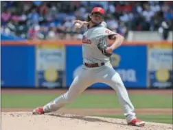  ?? SETH WENIG — THE ASSOCIATED PRESS ?? Phillies starting pitcher Aaron Nola has lately been closer to the Cy Young candidate of last year, including in Sunday’s 8-3 win over the Mets. But Jake Arrieta’s struggles leave Nola marooned as the starting rotation’s only steady contributo­r.