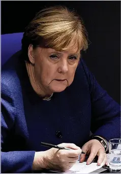  ?? Picture: EPA, REX ?? FEAR: Mrs Merkel worries the UK could be competitio­n for EU