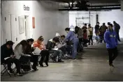  ?? MARCIO JOSE SANCHEZ — THE ASSOCIATED PRESS FILE ?? Unionized hospitalit­y workers wait in line in a basement garage to apply for unemployme­nt benefits at the Hospitalit­y Training Academy in Los Angeles on March 13.