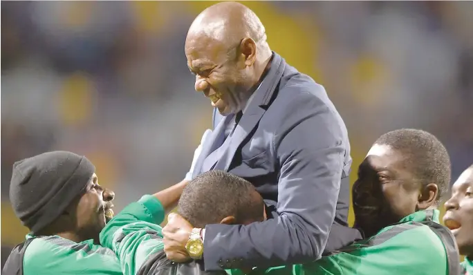  ?? ?? Emmanuel Amuneke lifted high by his assistants when he led Nigeria to 2015 U17 World Cup victory in Chile