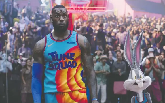  ?? PHOTOS: WARNER BROS. ?? NBA legend LeBron James teams up with Bugs Bunny — among other familiar Tunes — to make a film in which Warner Bros. casts itself as a character. Did we also mention that Warner Bros. made the film? Because, like the film, we can't say it enough.