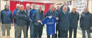  ?? ?? Mike Monaghan presenting a new set of jerseys to the club.