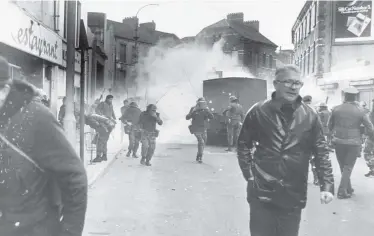  ??  ?? Troops on the streets during Bloody Sunday, and (below) our story yesterday