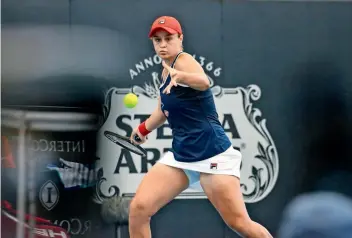  ?? AFP ?? TOUGH ENCOUNTER: Ashleigh Barty hits a return to Anastasia Pavlyuchen­kova during their 2nd round match. —