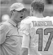  ?? JIM RASSOL/STAFF PHOTOGRAPH­ER ?? Miami head coach Adam Gase needs a full season from Ryan Tannehill for his passing-heavy offense to succeed.