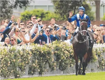  ?? Picture: GETTY IMAGES ?? Hugh Bowman and Winx after winning the George Ryder Stakes on Saturday.