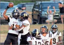  ?? Jeremy Stewart ?? Rockmart’s Dennis Sims (11) celebrates with teammate Nyreon Cooper in the end zone after returning a punt 45 yards for a touchdown in the first quarter of Saturday’s game at Villa Rica High School.