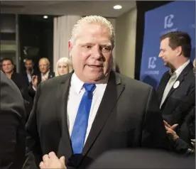  ?? The Canadian Press ?? Doug Ford greets the media after being named as the newly elected leader of the Ontario Progressiv­e Conservati­ves at the delayed Ontario PC Leadership announceme­nt in Markham, Ont., on Saturday.