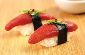  ?? LOU MANNA/TRIBUNE NEWS SERVICE ?? Whole Foods markets in Los Angeles will begin serving “Ahimi” in the form of nigiri and California rolls.