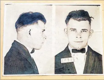  ?? [AP PHOTO/ THE INDIANAPOL­IS STAR, CHARLIE NYE, FILE] ?? This photo shows Indiana Reformator­y booking shots of John Dillinger, stored in the state archives, and shows the notorious gangster as a 21-year-old.