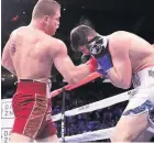  ??  ?? Canelo Alvarez launches another attack on Rocky Fielding