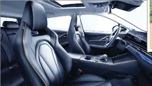  ?? ?? A piano black interior colour scheme is standard, and features include dual 10.25-inch (26cm) screen, powered sports seats, dual-zone climate control, ambient lighting and wireless phone charging.