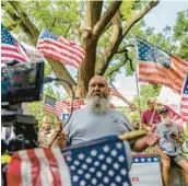  ?? GEMUNU AMARASINGH­E/AP ?? David Riddell of the 1776 Restoratio­n Movement, which wants a “constituti­onal republic,” speaks Monday near federal court, site of the Steve Bannon trial.