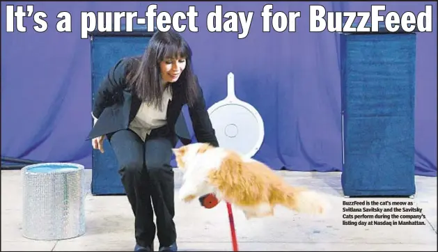  ?? ?? BuzzFeed is the cat’s meow as Svitlana Savitsky and the Savitsky Cats perform during the company’s listing day at Nasdaq in Manhattan.