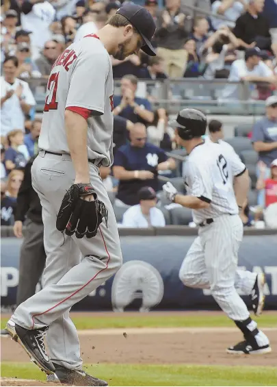  ?? AP PHOTO ?? DEEP THREAT: Drew Pomeranz kicks the mound after allowing a solo home run to Chase Headley (12) during the second inning of the Red Sox’ 5-1 loss to the Yankees yesterday in New York.