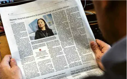  ?? Clement Sabourin/AFP ?? Jornal canadense noticia a prisão de Meng Wanzhou, executiva da gigante de tecnologia Huawei