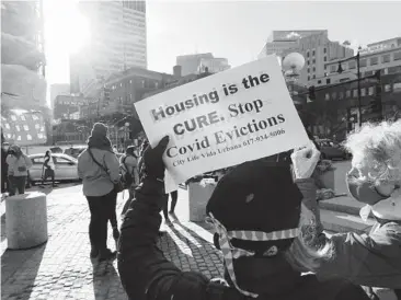  ?? MICHAEL DWYER/AP ?? Tenants’ rights advocates demonstrat­e Jan. 13 outside the Edward W. Brooke Courthouse in Boston. Millions of U.S. residents face eviction.