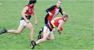  ??  ?? Longwarry’s Callum Spain breaks clear; Photograph­s: Amity Stephens.