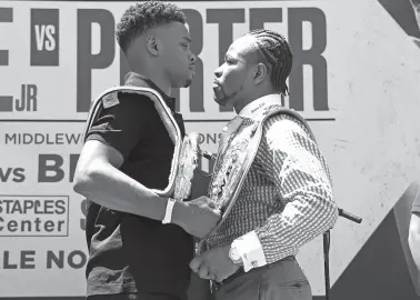  ??  ?? ERROL Spence Jr., left, and Shawn Porter face off during a press conference at Staples Center Star Plaza to preview their upcoming welterweig­ht championsh­ip fight.