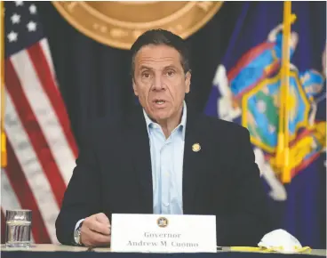  ?? John Roca / New Yo rk Post via the asociate d pres Pool ?? At one of his media conference­s during the COVID-19 crisis, New York Gov. Andrew Cuomo was adamant when he said “we’re not going to put a dollar figure on human life.”