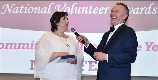  ??  ?? Committee Officer of the Year Nora Fealy, Co. Kerry, speaks with MC Dáithí Ó Sé during the 2018 LGFA Volunteer of the Year awards night. Croke Park, Dublin Photo by Sam Barnes / Sportsfile