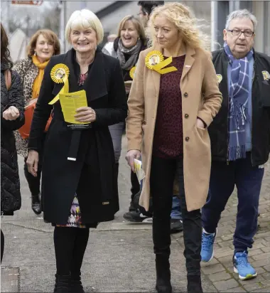  ??  ?? On the campaign trail in Ballisodar­e, Independen­t candidate Marian Harkin was joined by family members, and supporters including Independen­t Councillor Marie Casserly. Pic: Donal Hackett