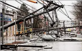  ?? GREG COOPER/EPA ?? The nor’easter knocked out power to 1.6 million customers on the East Coast.