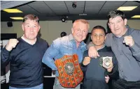  ??  ?? ●●Darren Connellan, Brian Kelly, Shahruf Ali and Tony Connellan presenting the Dennis Connellan shield for the Boxer of the Year