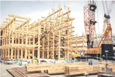  ?? ?? Constructi­on of the “Grand Roof ”, known as the Ring, one of the world’s largest wooden structures, at the site of the 2025 Expo on Yumeshima island, an area of reclaimed land in Osaka.