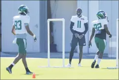  ?? SETH WENIG - THE ASSOCIATED PRESS ?? New York Jets’ Denzel Mims (11) stand off to the side during a practice at the NFL football team’s training camp in Florham Park, N.J., Thursday, Aug. 20, 2020.