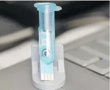  ?? ADRIAN SHELLARD/ FOR THE CALGARY HERALD ?? A FREDsense prototype sensing cartridge uses bacteria to test for water pollutants and was the catalyst for a new Calgary business.