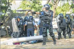  ?? AP ?? DISPARO. Los policías tuvieron el apoyo de bandas sandinista­s.