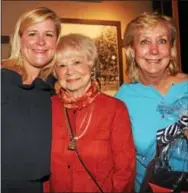  ??  ?? Self-help guru Elizabeth Chance of Radnor spends time with Dorothy and Patrice Growney Aitken, both of Villanova.