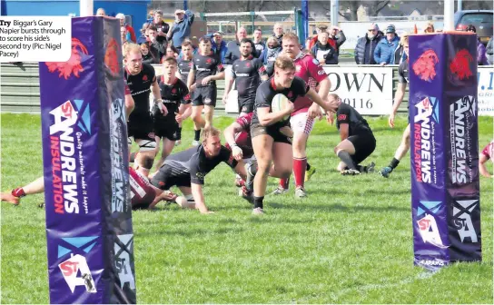  ?? ?? Try Biggar’s Gary Napier bursts through to score his side’s second try (Pic: Nigel Pacey)