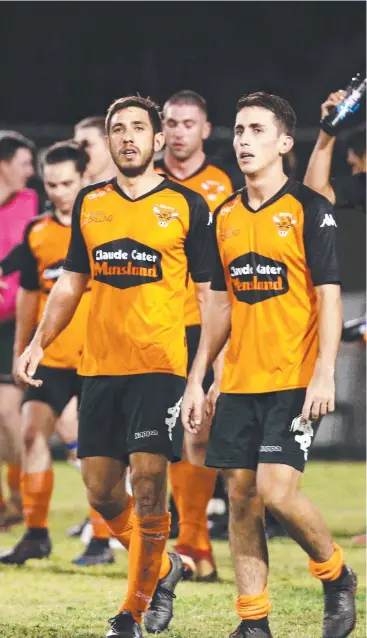  ?? Picture: BRENDAN RADKE ?? BITTER PILL: Mareeba's Ben Stabile and Darcy McCormack appear dejected after their team's seasonendi­ng loss to Leichhardt.