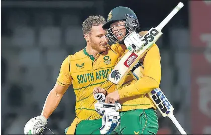  ?? AJAY AGGARWAL/HT PHOTO ?? South Africa’s Rassie van der Dussen (right) and David Miller celebrate after winning the first T20I against India.