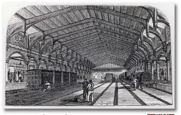  ?? George Meason ?? The GWR trainshed at Bristol, circa 1850, with a ‘Fire Fly class 2-2-2 just arrived. At coach roof level on the left is a sign ‘Up Train From Exeter’. One of the men in the centre of the view has a three-link coupling over his shoulder. Pre-dating photograph­y, it is engravings and lithograph­s such as this that record the earliest days of this railway, this particular example appearing in The Illustrate­d Guide to the GWR. Isambard Kingdom Brunel was the engineer for both the GWR and the Bristol & Exeter Railway, hence they were both built to his broad gauge of 7ft 0¼in, allied and ultimately amalgamate­d, trains from the west initially reversing into the Bristol terminus due to its alignment towards London, Bristol was linked to Bridgwater from 14 June 1841; to Taunton from 1 July 1842; to Beam Bridge from 1 May 1843; and to Exeter from 1 May 1844. So Bath was the first destinatio­n from Bristol, by GWR from 31 August 1840, followed by Bridgwater (B&ER), and then the GWR line through to London was completed on 30 June 1841.