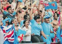  ??  ?? Fijian Fans in full support. A powerful cheer motivates a team and this is what the fans did during the Singapore Sevens last weekend.