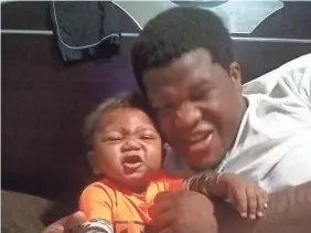  ?? AP ?? Jemel Roberson, father of a baby named Tristan, worked as a security guard for a bar in Robbins, Ill., where he was shot by a police officer.