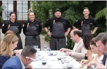  ?? COURTESY OF DAVID MOIR ?? Santana, third from left at rear, is one of four Americans in a field of 16 competitor­s in “Top Chef World All-Stars,” which was taped in London. The 20th “Top Chef” season premieres this week.