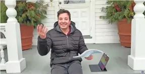  ??  ?? Fallon delivers an opening monologue on the porch of his home during an episode of “The Tonight Show: At Home Edition” posted March 19 on YouTube.