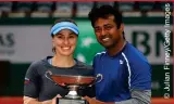  ??  ?? PLAN: Leander Paes with Martina Hingis of Switzerlan­d after winning the mixed doubles title at the 2016 French Open