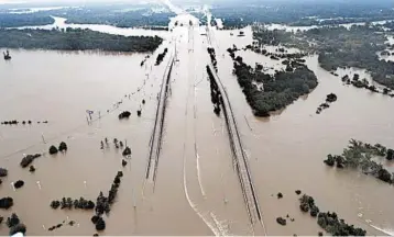  ?? DAVID J. PHILLIP/AP ?? Experts don’t agree on whether — or how much — human-caused climate change is responsibl­e for meteorolog­ical stickiness that kept Harvey stationary over South Texas.