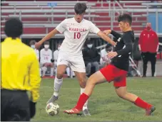  ?? RANDY MEYERS — FOR THE MORNING JOURNAL ?? Fairview’s Dorian Blazevic and Brookside’s Drew Pospisil compete for a ball near midfield during a Division II sectional semifinal Oct. 20.