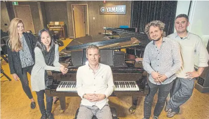  ?? RICK MADONIK TORONTO STAR ?? Five members of the nation-roaming Piano Six — New Generation. From left, Marika Bournaki, Angela Park, David Jalbert, Daniel Wnukowski and Ian Parker will join their colleague Anastasia Rizikov in concert Tuesday at St. Lawrence Centre’s Jane Mallett Theatre.