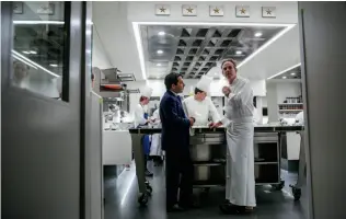  ??  ?? Manager Michael Minnillo (left) and chef Thomas Keller at the French Laundry.