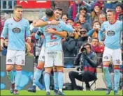  ?? REUTERS ?? Celta Vigo's Maximilian­o Gomez celebrates with Hugo Mallo after scoring the team’s second goal against Barcelona.