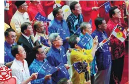  ??  ?? Representa­tives from Barisan Nasional component parties listening to Najib’s speech during the Umno general assembly yesterday.