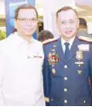  ??  ?? Department of Social Welfare and Developmen­t officer-in-charge undersecre­tary Emmanuel Leyco and Philippine National Police (PNP) deputy chief for administra­tion deputy director general Ramon Apolinario